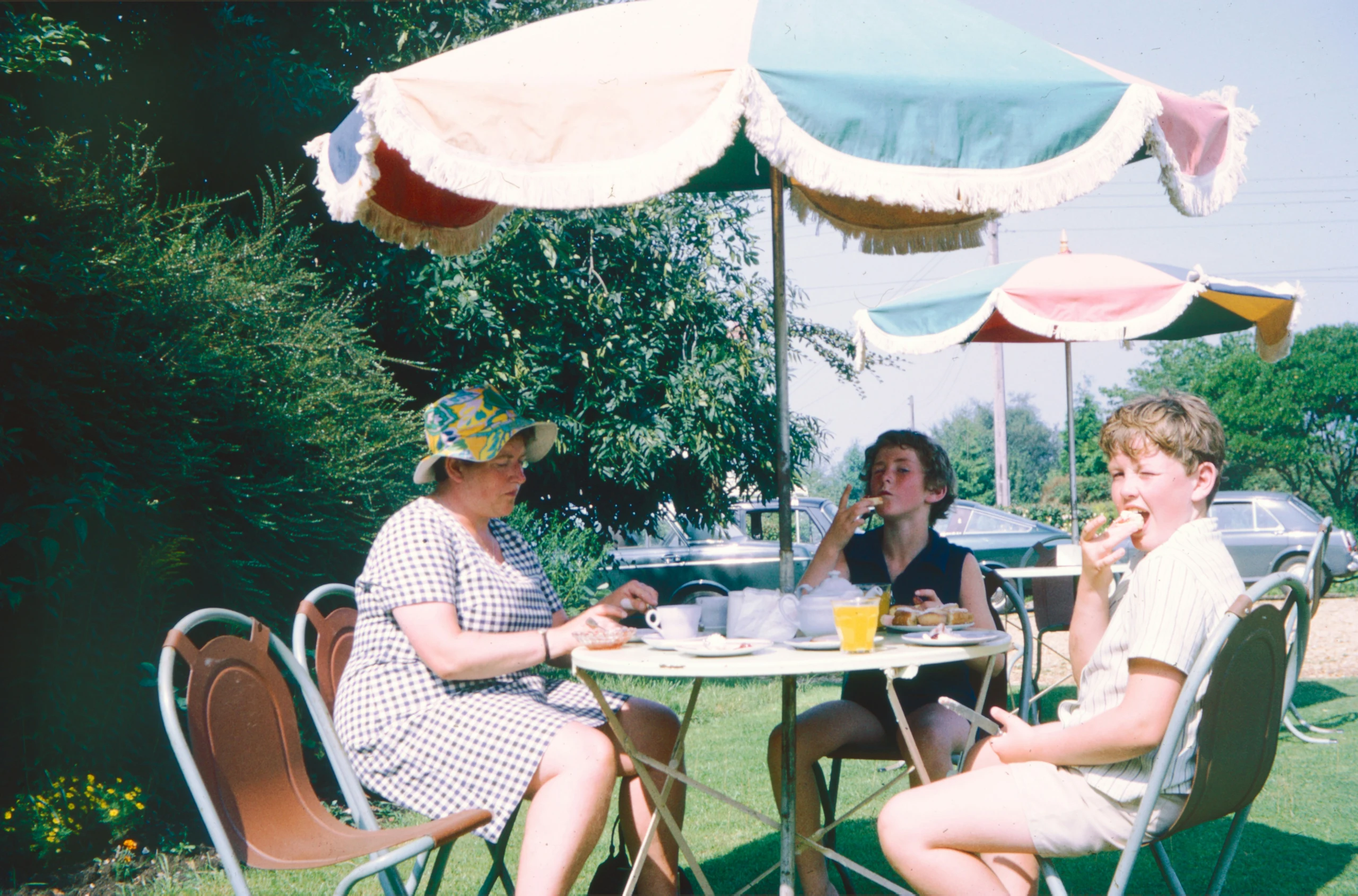 Family enjoying lunch in garden