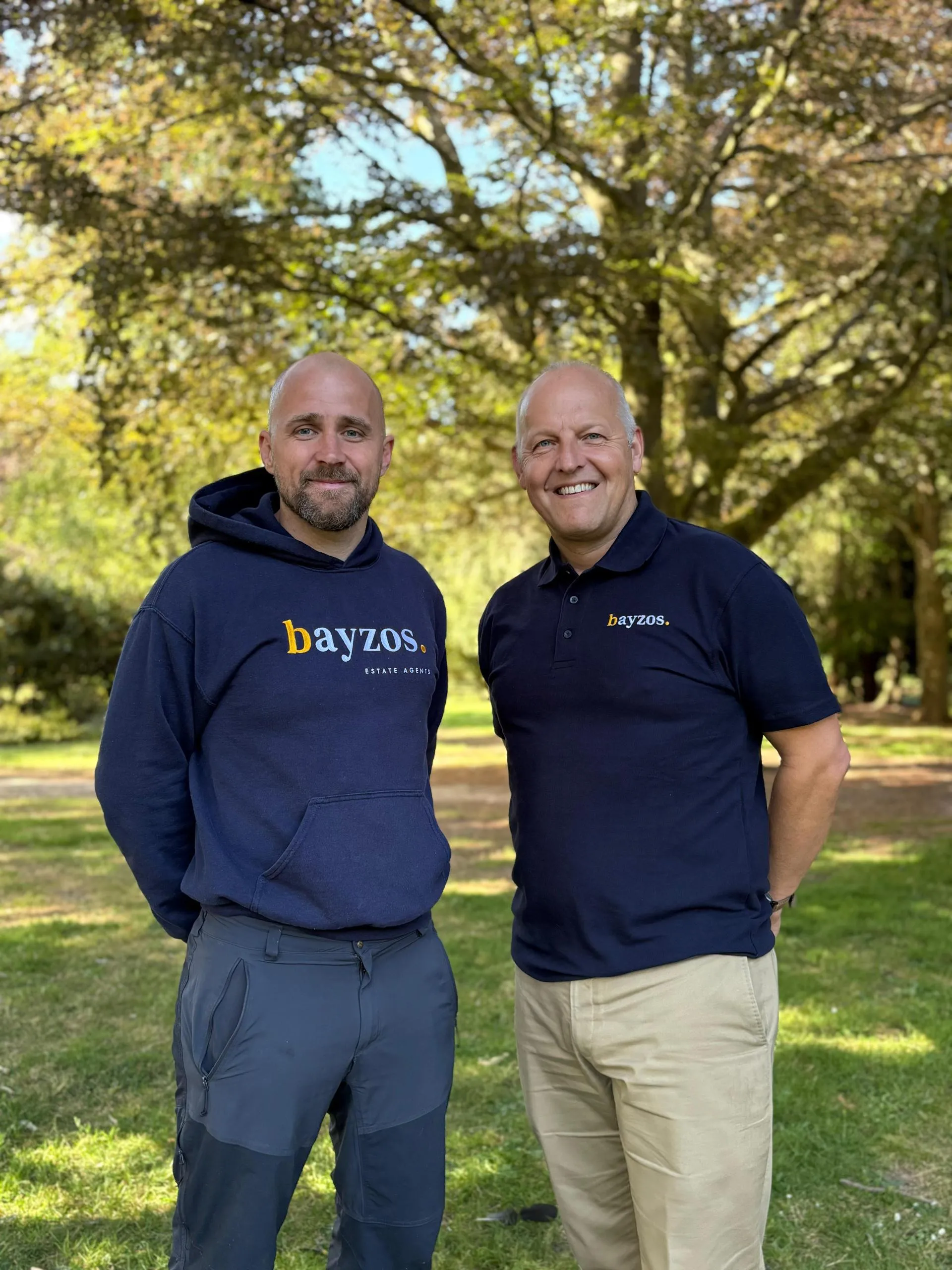 Gary, founder of Bayzos Estate Agents, stands next to Mike, the custodian of Sheldon Bosley Knight and director of SBK Sales Ltd