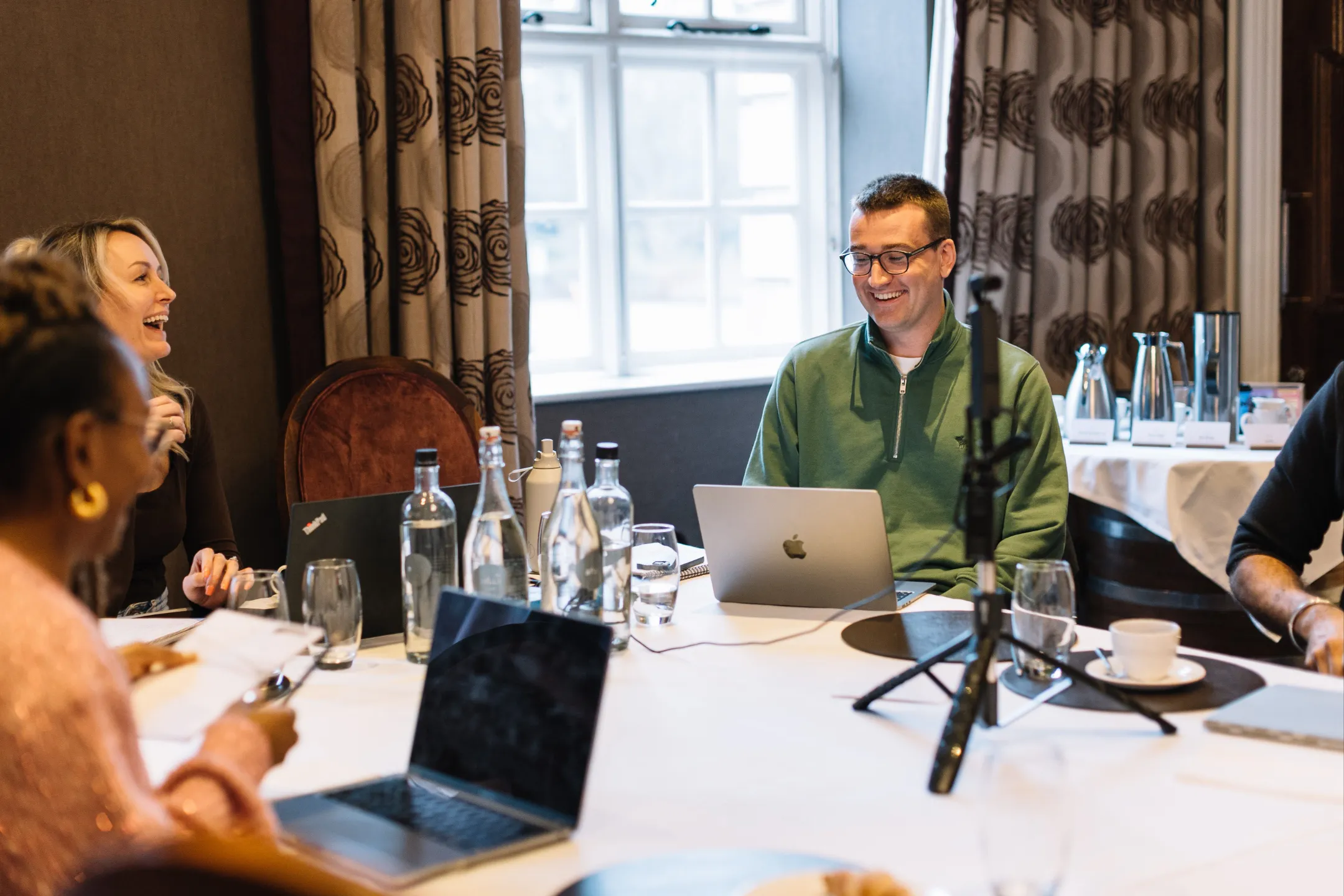 Property mentoring session with professionals discussing investment strategy