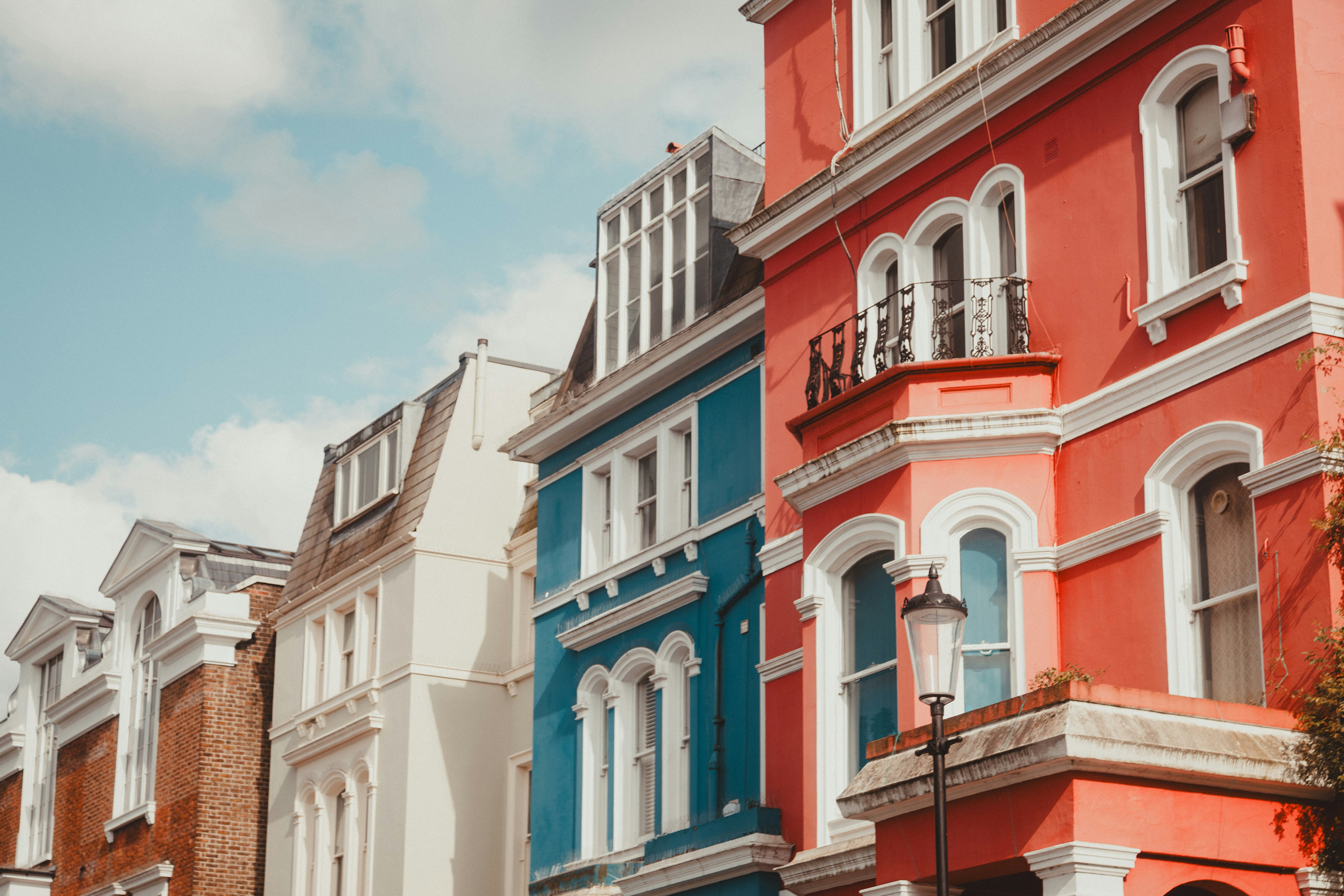 Row of colourful Victorian terraced houses
