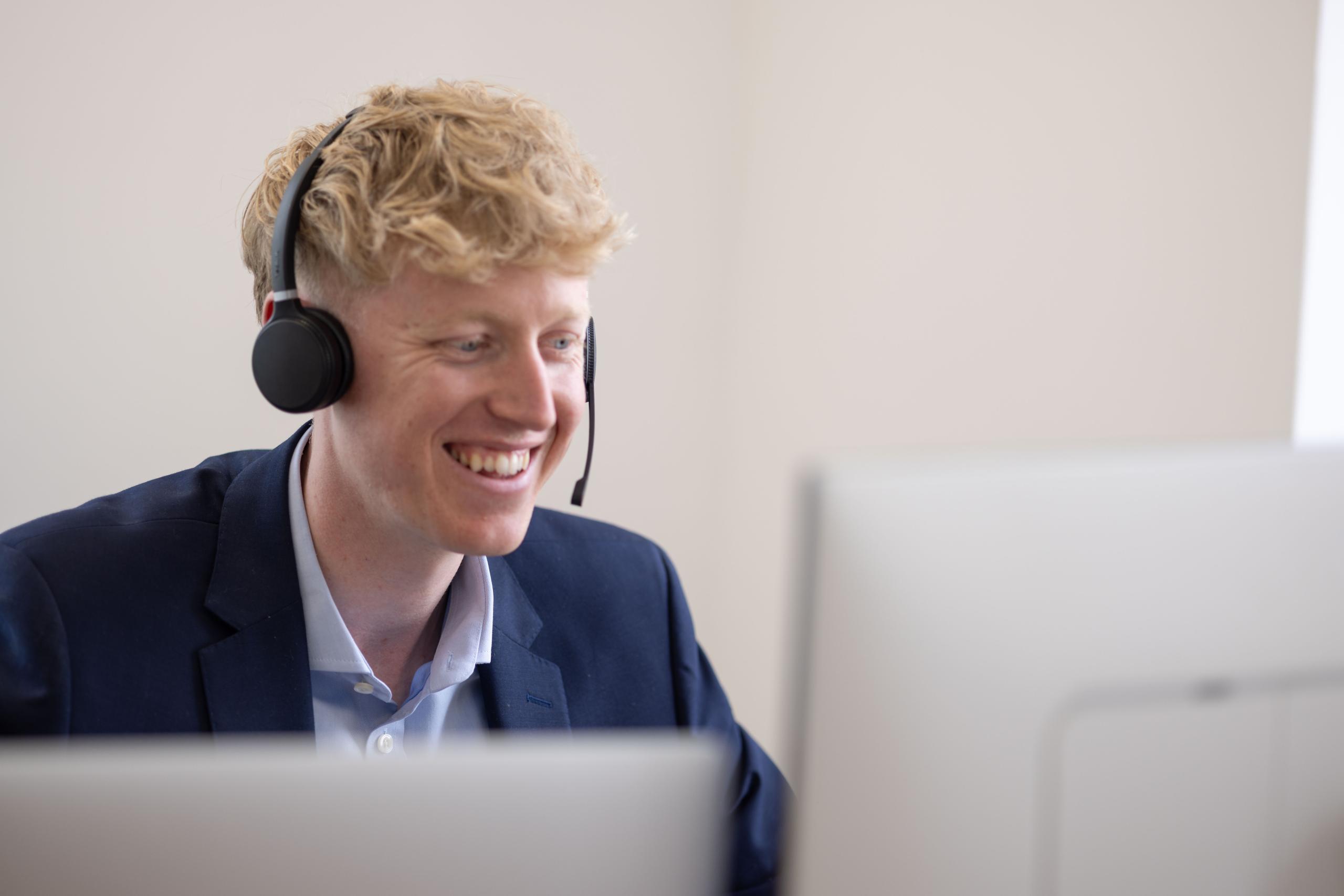 Jack Wright working with headset