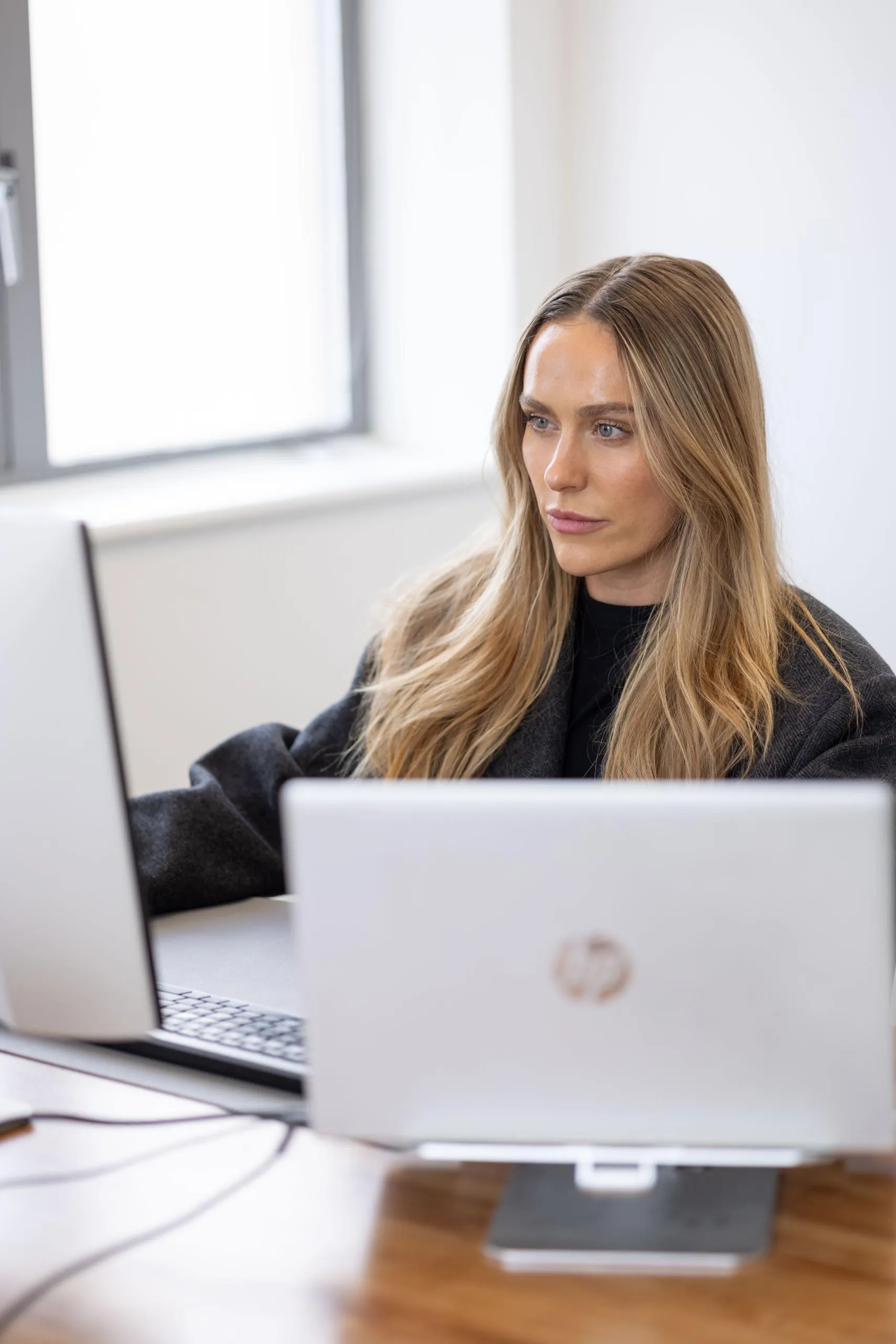 Agent working on laptop