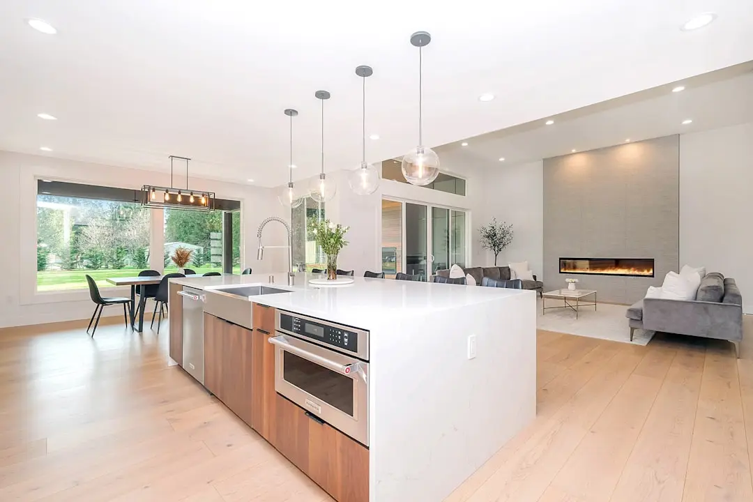 Warm, modern kitchen with white and brown counters