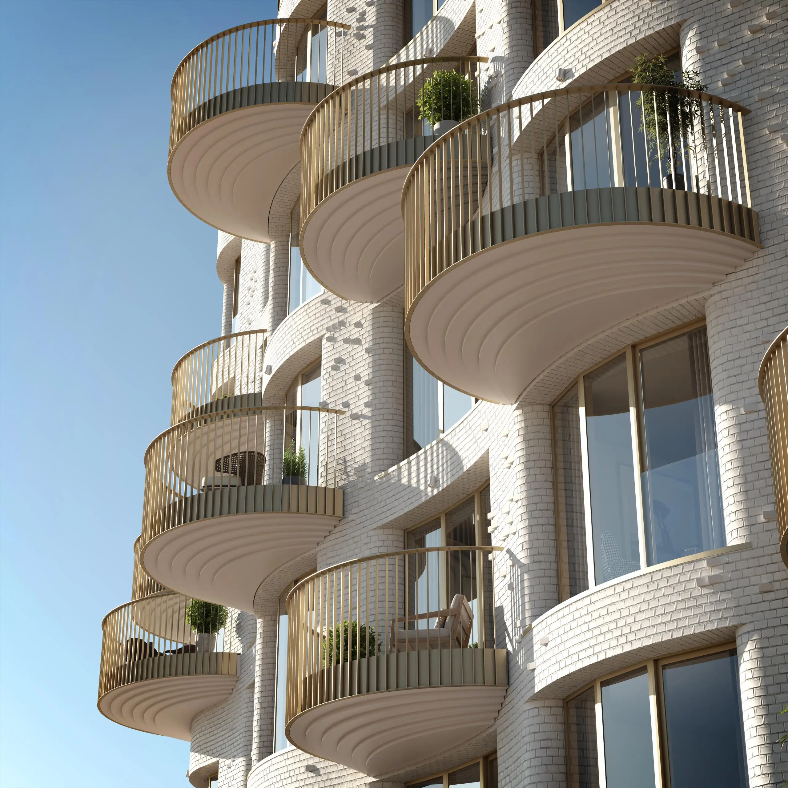 Modern white brick building with curved balconies featuring metal railings and potted plants against a clear blue sky