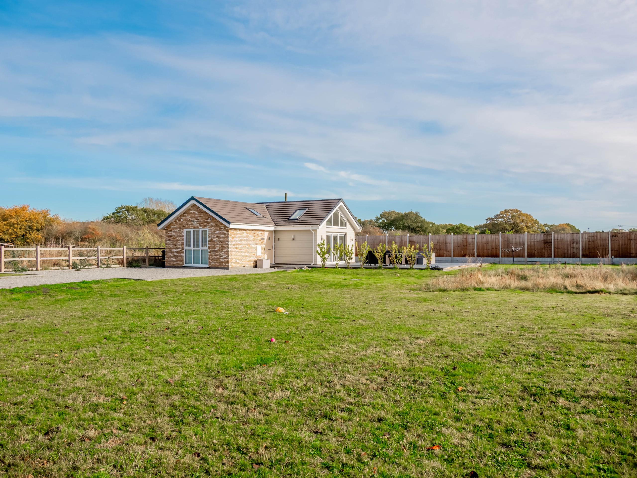 External view of a property with surrounding land