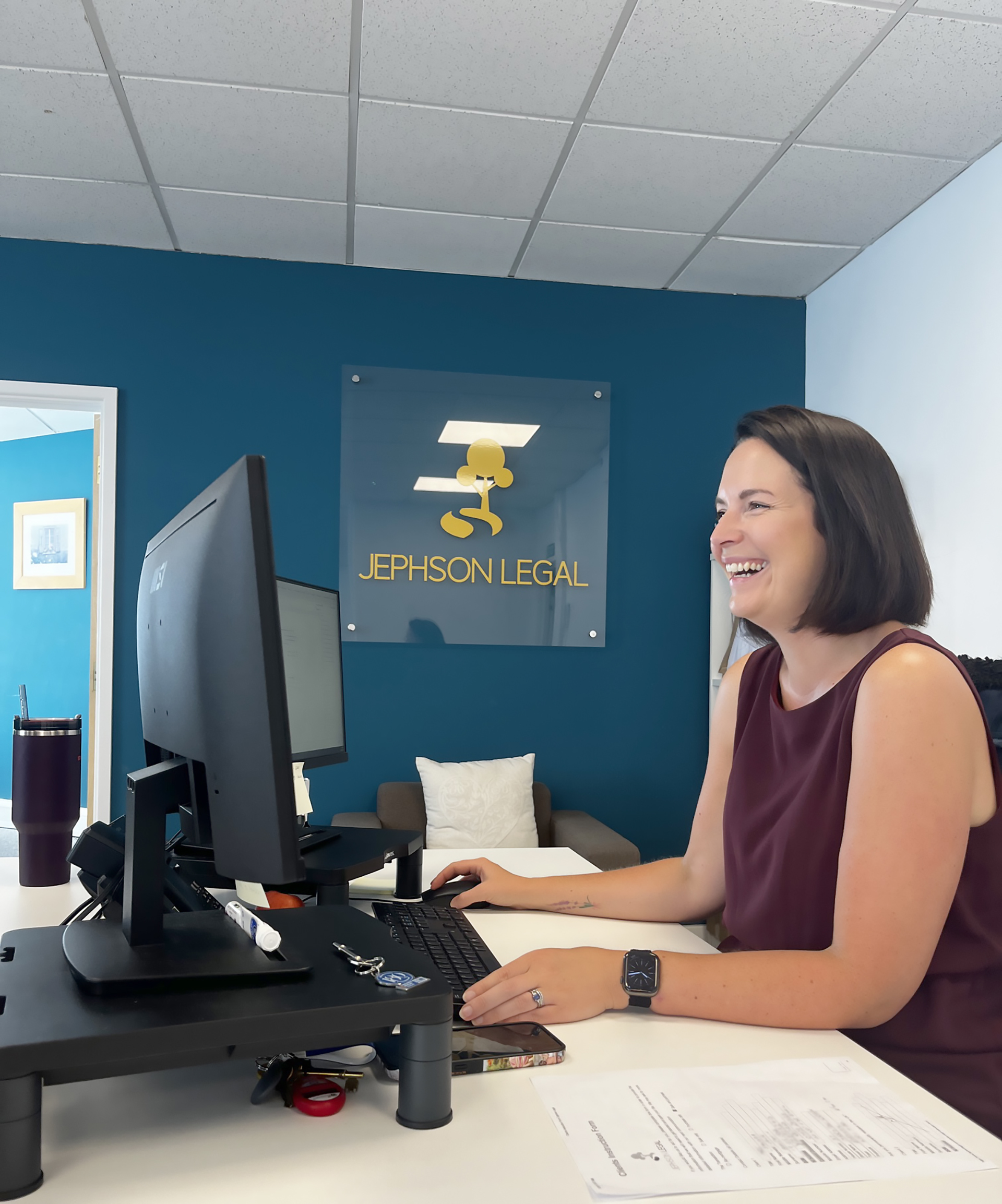 Felicity from Jephson Legal sits at her computer