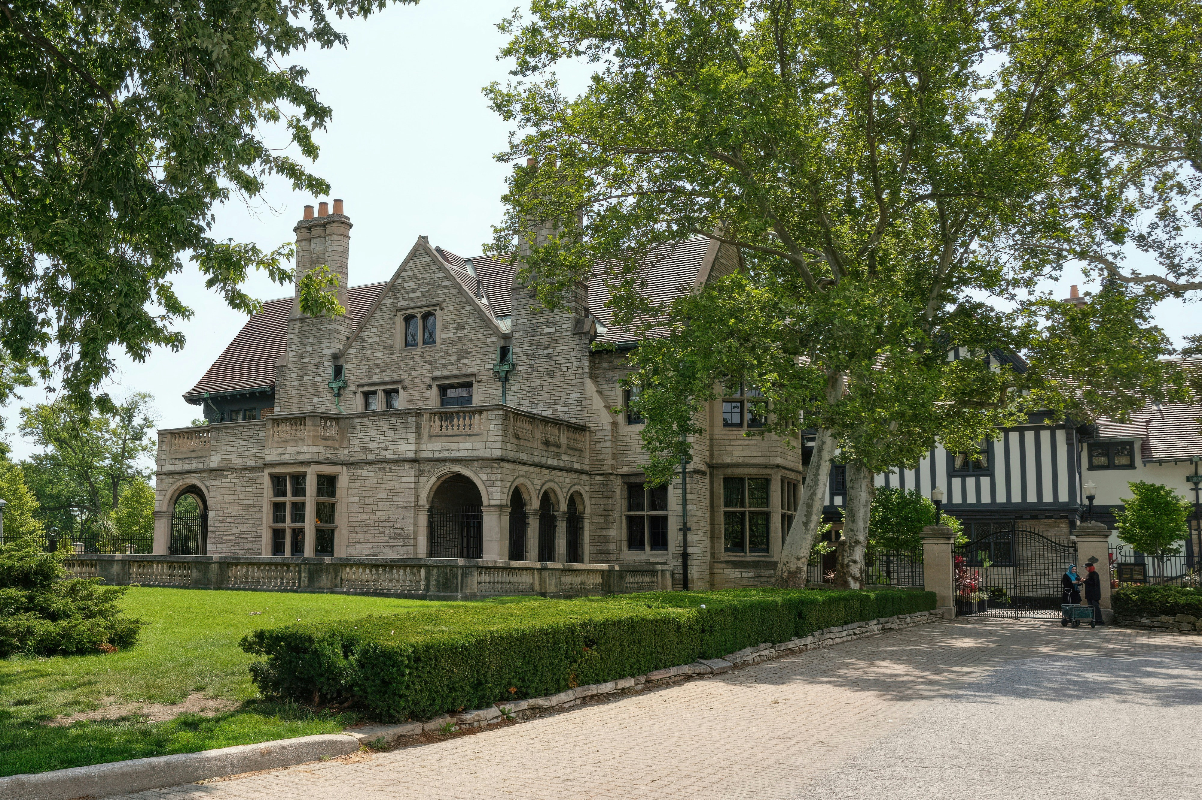 A stone period property with manicured grounds — the type of home Holters expertly markets across Mid-Wales and Shropshire