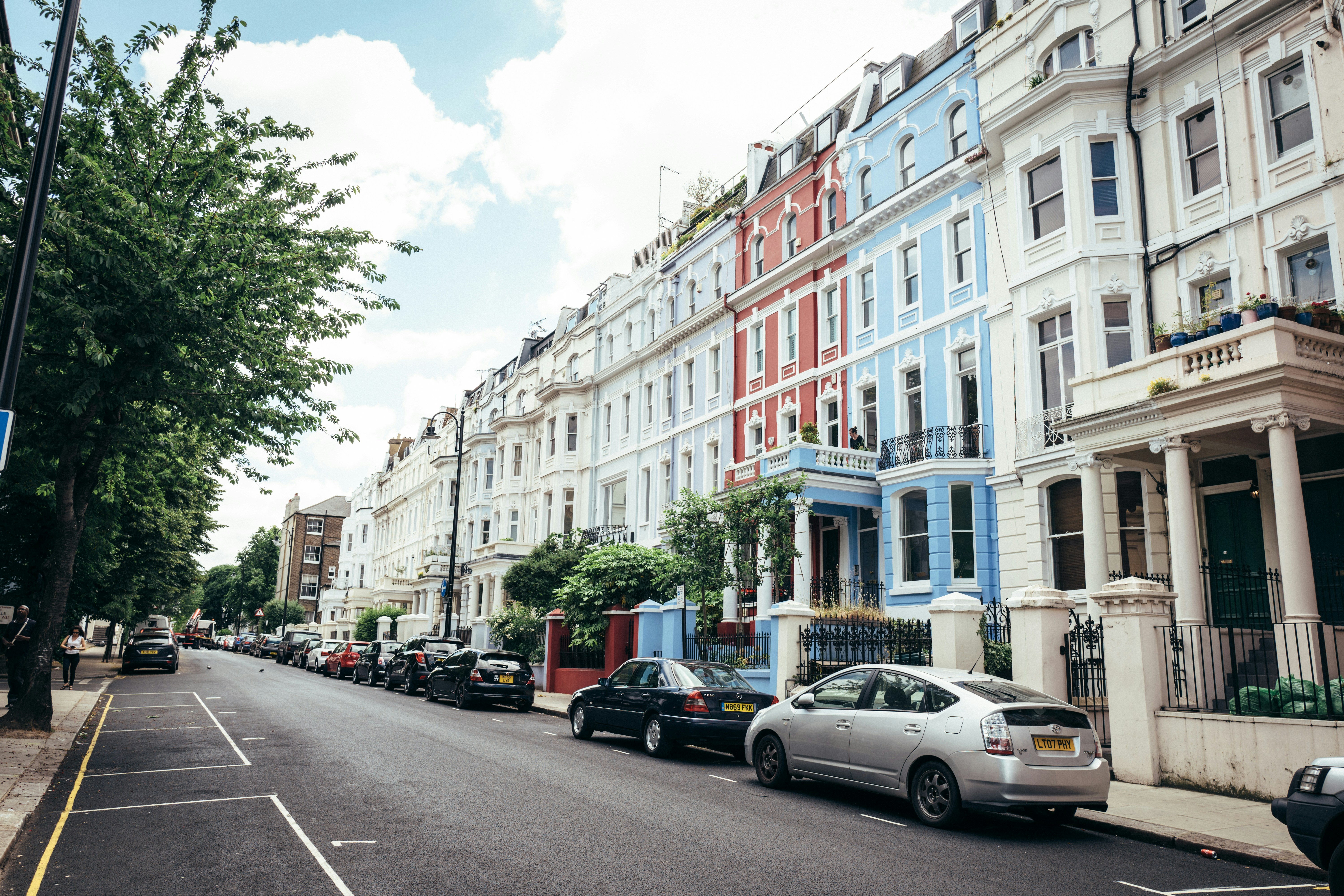 Multi-coloured city street in London with period buildings