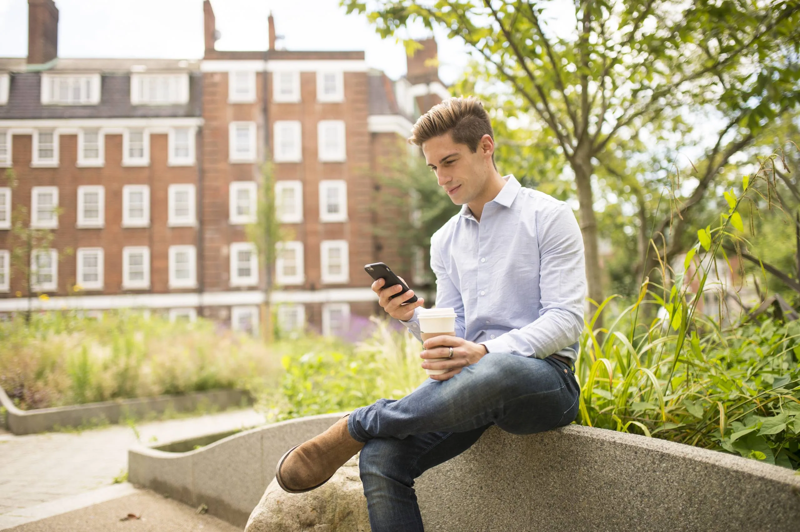 A customer checking their phone for updates while on the go