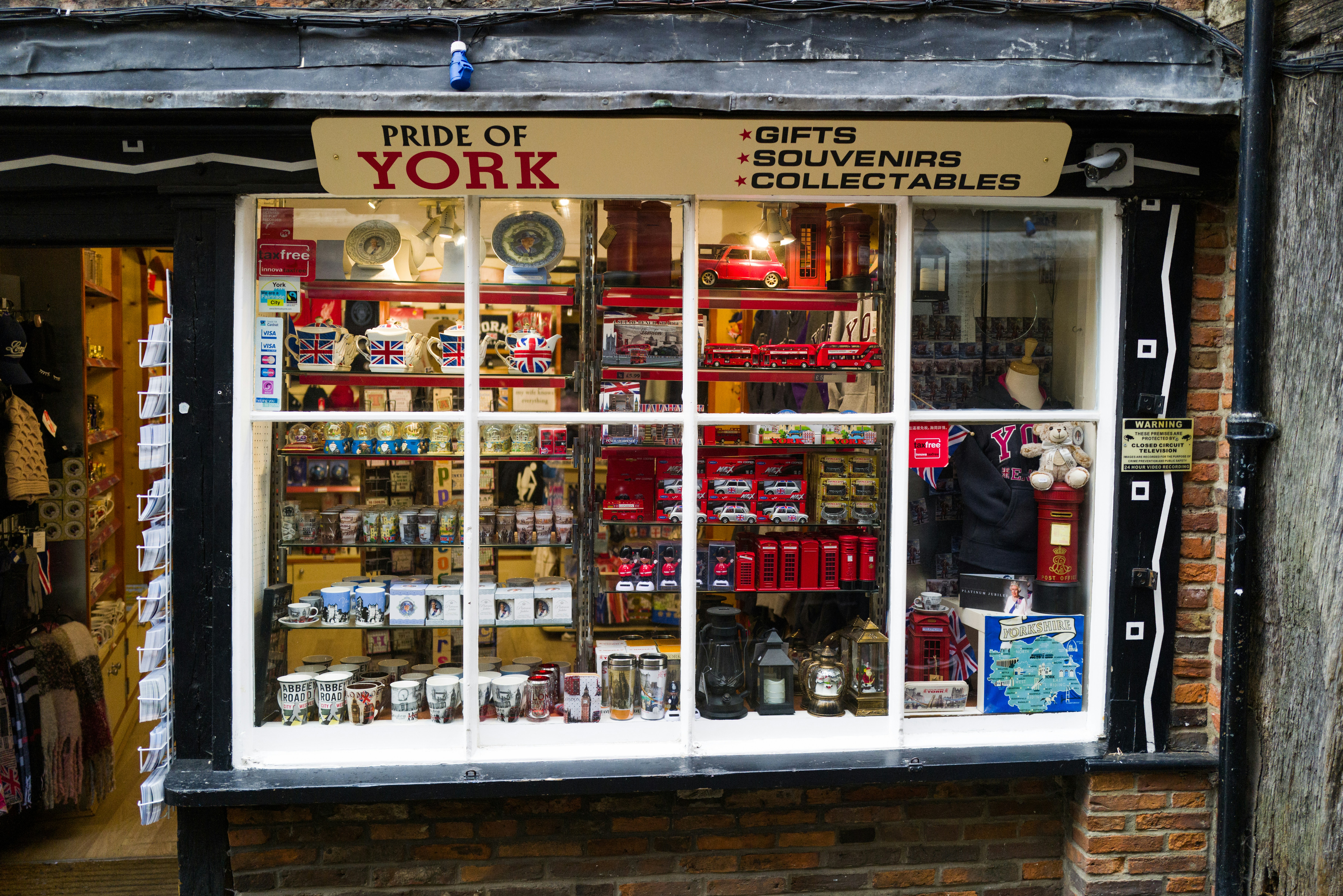 Shop window display — representing a multi-unit retail portfolio sale in Brighton