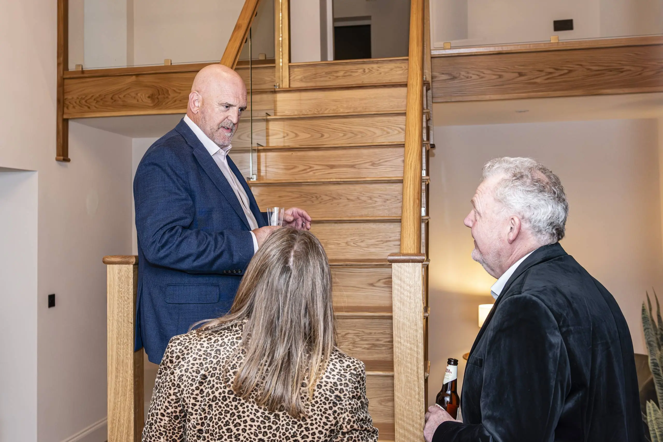 A property consultant and client in a professional one-to-one consultation, reflecting FIFTY's personal, relationship-led service