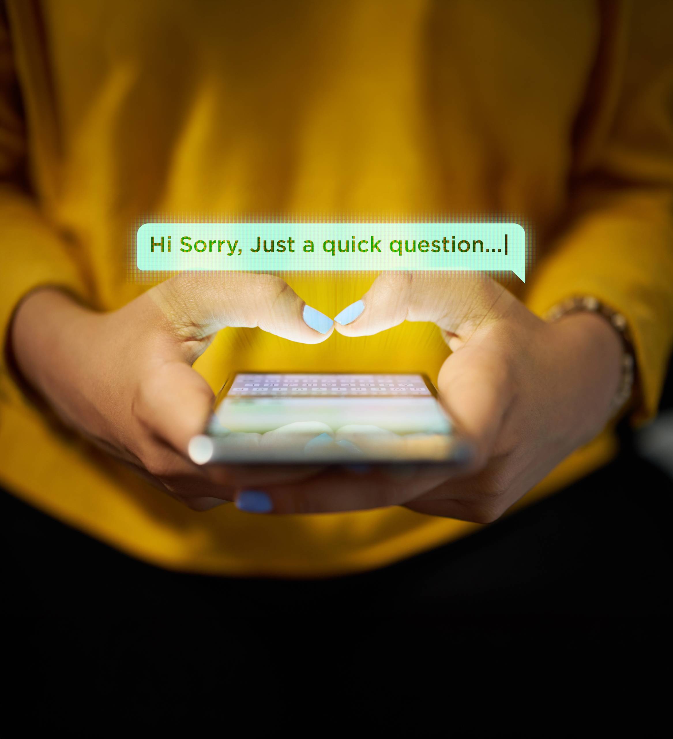 Someone holding a phone showing a notification on WhatsApp