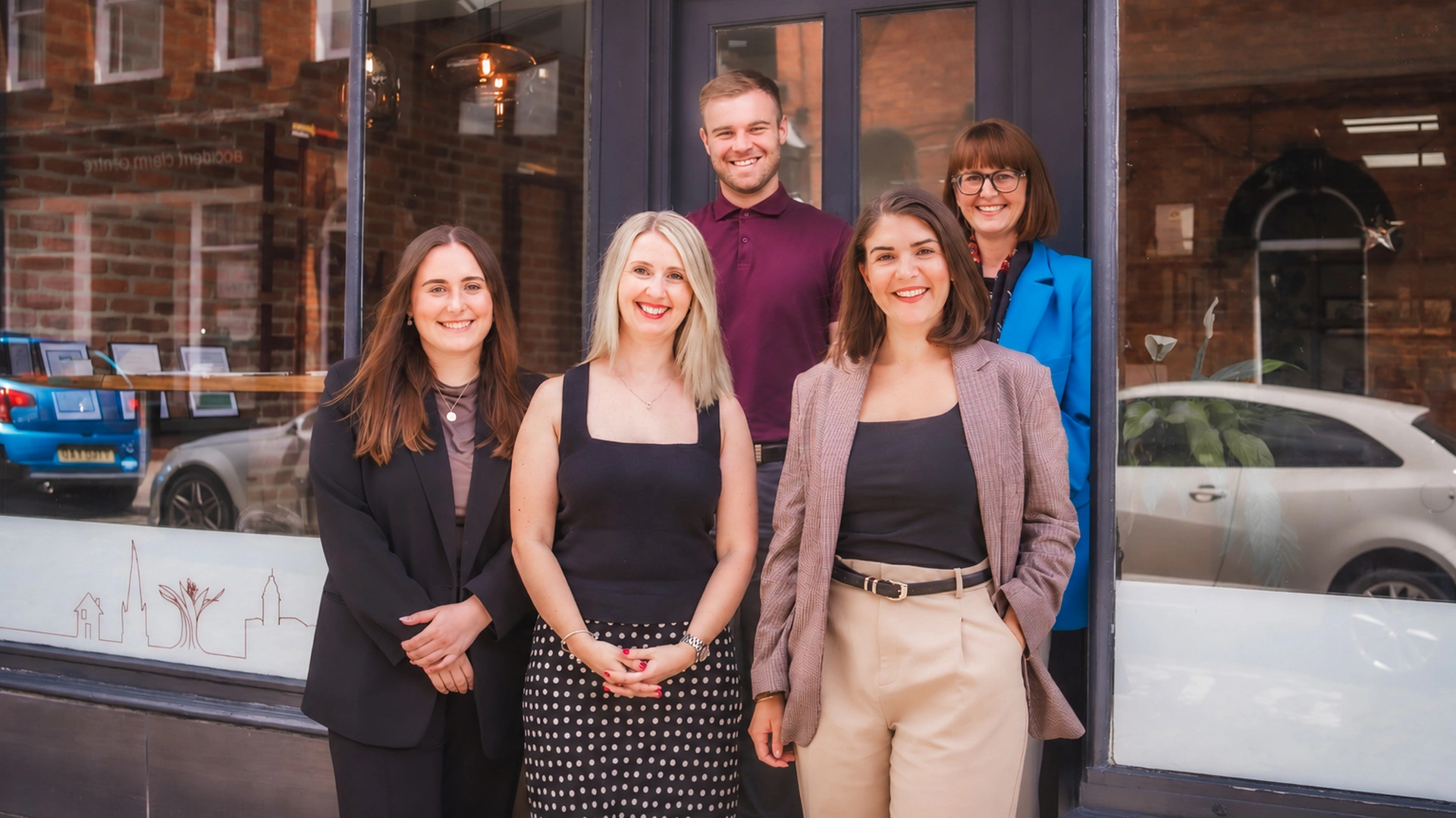 Some of the Redbrik team stood outside their Chesterfield office