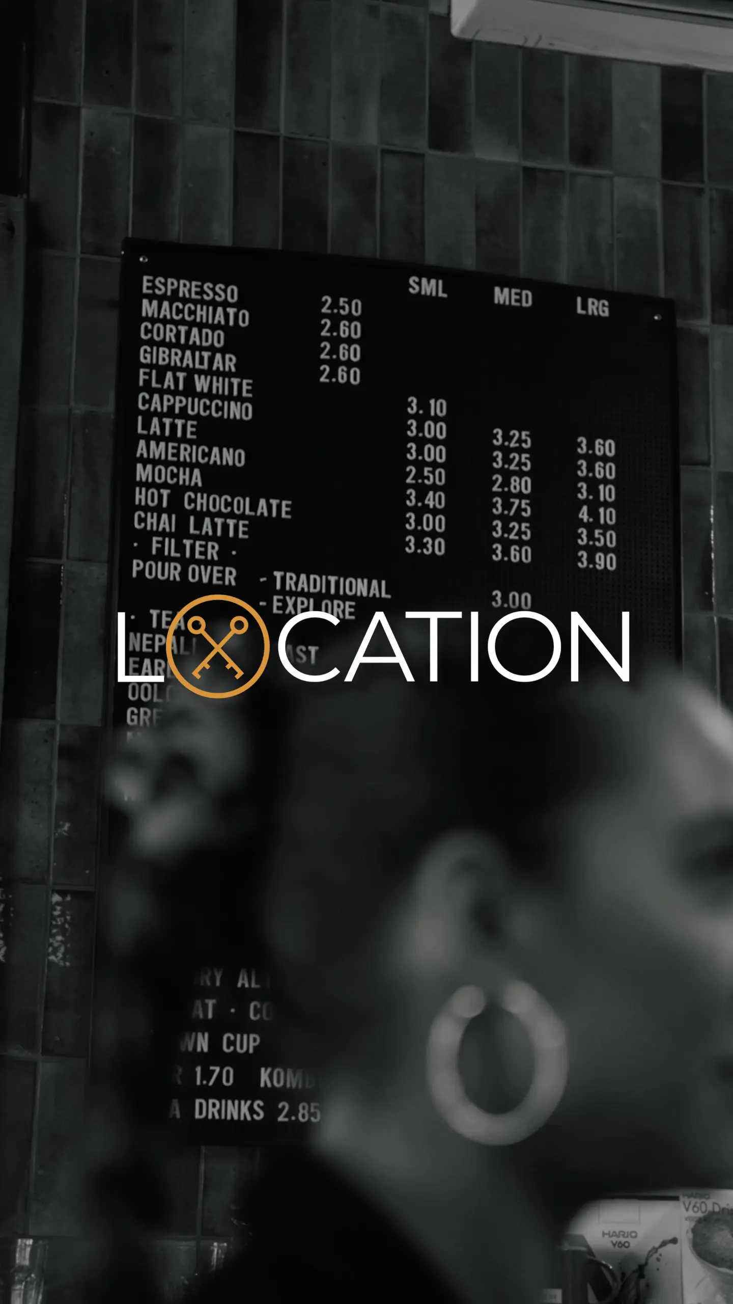 Coffee shop menu board displaying drinks and prices, with 'Location' logo overlay