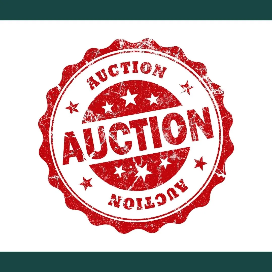 Red distressed circular stamp with text "AUCTION" and decorative stars