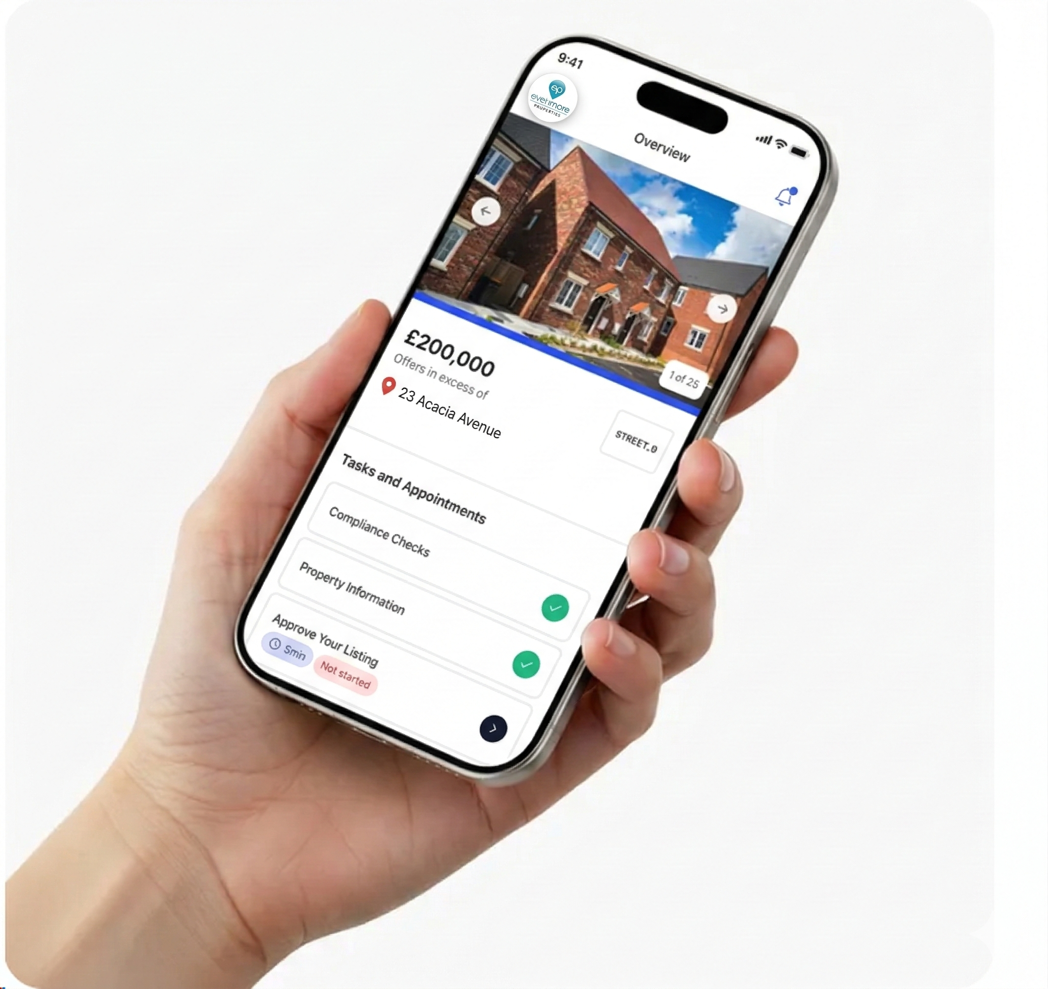 A hand holding a phone displaying a property overview screen from the Street.co.uk app.