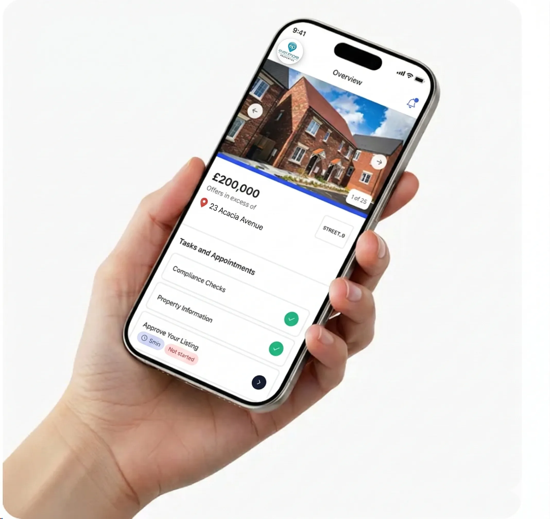 A hand holding a phone displaying a property overview screen from the Street.co.uk app.